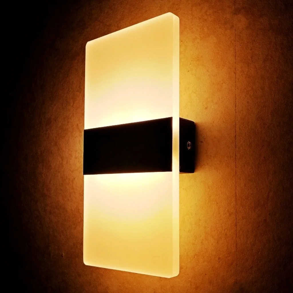 Glow panel wall sconce on a dark wall